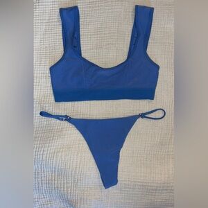Frankie’s bikini blue swimsuit small top & large thong bottom